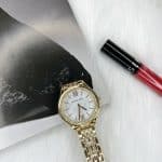 Reloj MK mujer dorado números romanos